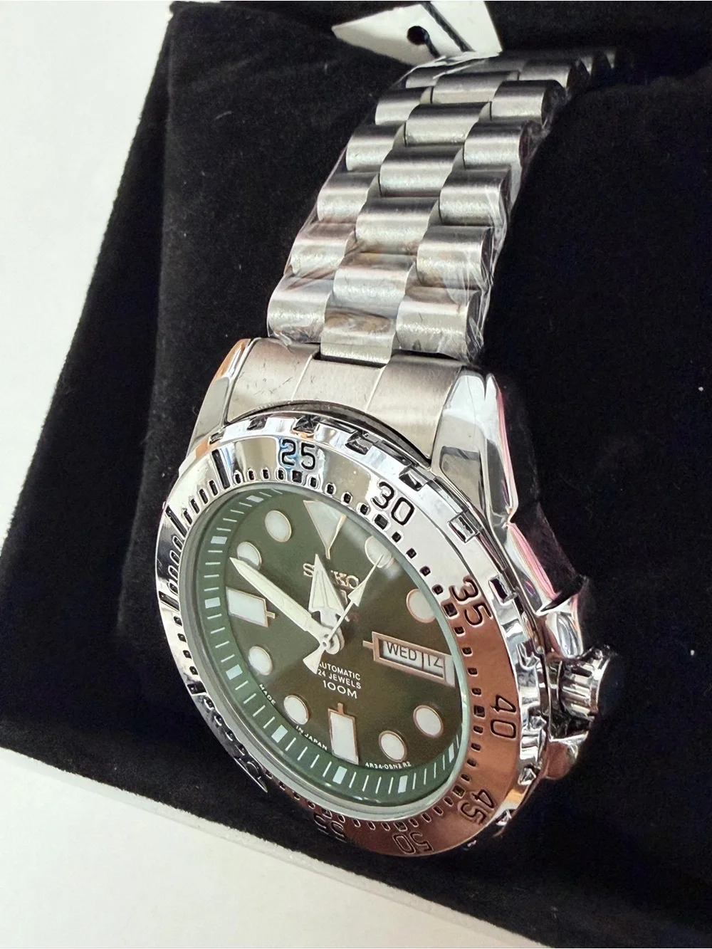 Seiko Stainless Steel Watch with Green Dial and Silver Bezel